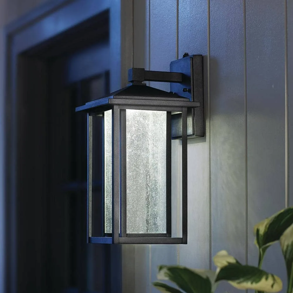 homedepot.com ChatGPT ad — Home Decorators Collection Mauvo Canyon 15.5 in. Black Dusk to Dawn LED Outdoor Wall Light Fixture Porch Sconce with Seeded Glass